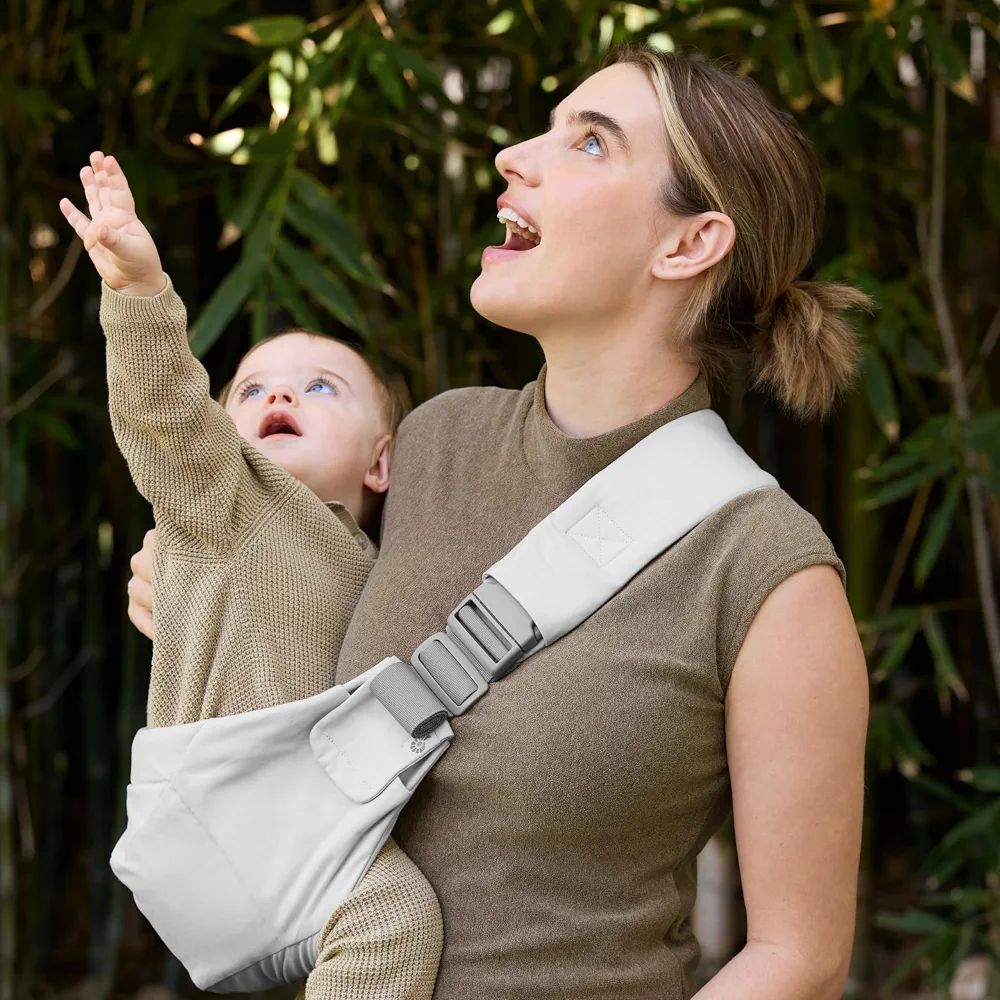 Ergobaby Upsie Sling Porte-hanches ergonomique pour bébés et tout-petits à partir de 6 mois (7,7 à 20,4 kg), commutation spontanée entre la marche et le transport, gris perle